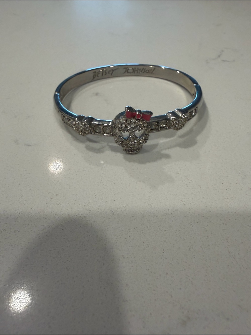 Betsey Johnson Silver Crystal Skull Bangle with Pink Bow